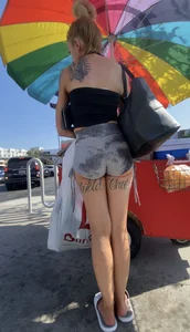 Milf with cheeks out and “Wild” tattoo