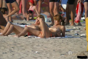 Beach voyeur girls in bikinis, thongs and topless
