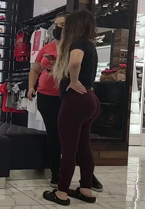 Giant ass in leggings at the clothing store creepshot