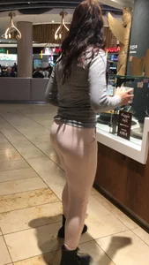 Sexy brunette in pink leggings getting food with a great ass and beautiful face