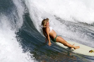 Candid surfer babes on the beach and in bikinis
