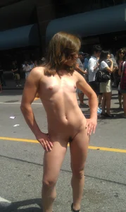 Nude small boobed girl at Toronto pride parade with a couple bonus girls