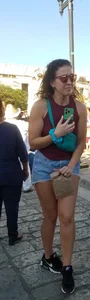 Laughing girl in shorts, legs and thick peach
