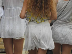 White see through skirt girl walking with white panties underneath