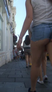 Daisy dukes candid girl showing her ass cheeks