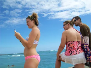 Sexy friends on vacation in pink and black bikinis with decent asses