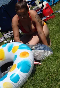 Thick girl with tattoos, big tits and a big booty in a little bikini