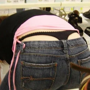 Bunch of girls with their thongs hanging out