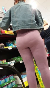 Shopping girl ass view in que