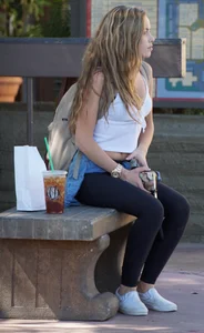 Beautiful babe out walking in leggings and showing some cleavage of her perfect tits