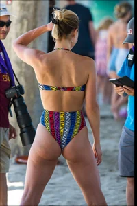 Beach girl with an incredible body in a funky looking bikini
