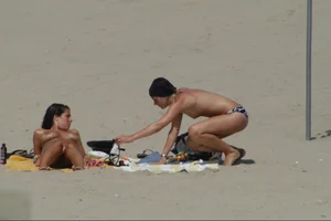 Girls on a nude beach in Sitges, Spain