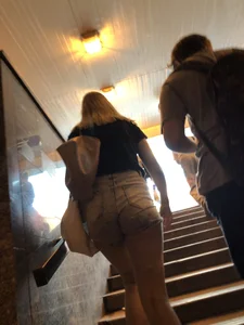 Teen in Denim Shorts Walking up the Stairs Closeup Creepshots