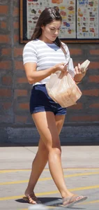 Hot brunette with a great ass in tight denim shorts
