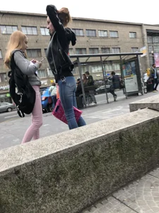 Cute skinny blonde candid teen wearing tight pink jeans