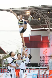 Bunch of athletic Thai cheerleaders at a competition