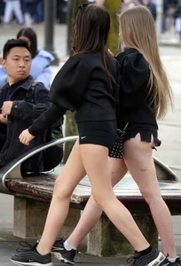Two teens show off their butt cheeks in short shorts