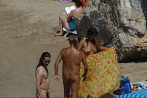 Girls on a nude beach in Sitges, Spain