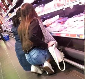 Girl With a Little Hot Booty in Jeans Squatting at a Supermarket Creepshot