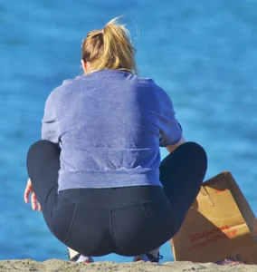 Beach blonde in leggings with a decent booty