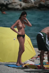 3 amazing topless girls on a nudist beach