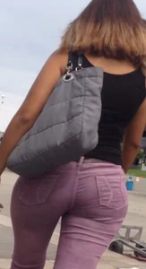 Black babe with a nice ass in tight jeans and vpl