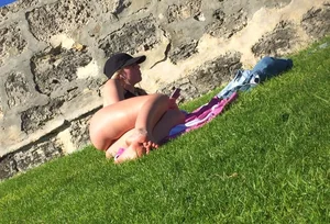 Candid Girl Lying on the Grass in Underwear