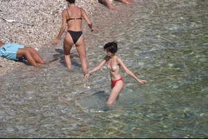 Nude girls on a beach in Hvar, Croatia
