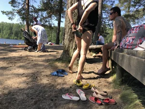 Candid Girl Putting On Swimsuit and Undressing at the Forest Lake Beach Gallery