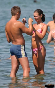 A bunch of sexy beach voyeur babes in bikinis, thongs and topless