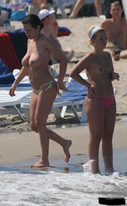 A bunch of sexy beach voyeur babes in bikinis, thongs and topless