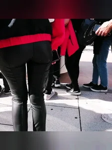 Ass in leather pants closeups on the street