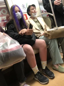 Teen Girl in a Mask and Cute Socks Subway Photos