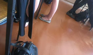 Skinny Candid Girl's Legs And Feet in Flats in College Class