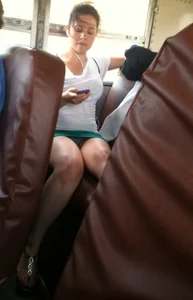 Hot Girl in a Short Skirt Accidentally Flashing Her Panties While Sitting in a Public Bus Creepshot