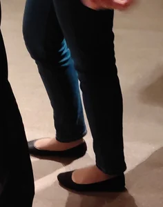 College teens' feet in flats closeups