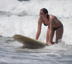 Candid surfer babes on the beach and in bikinis