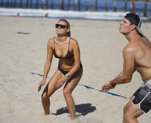 Hot candid girl playing beach volleyball in a swimsuit and sunglasses creepshots