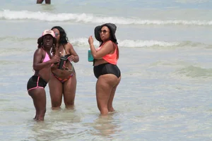 Ebony beach and bikini girls