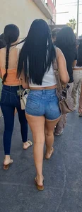 super sexy denim short shorts on this brunette with tremendous legs and big butt