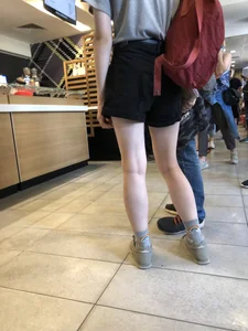 Girl with Cute Skinny Legs in Black Shorts Candid Pic