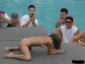 Beach voyeur girls in bikinis, thongs and topless