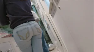 Cute Ass in Blue Tight Jeans at the Store Closeup