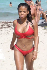 Christina Milian in red bikini in Miami with hard nipples