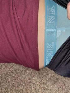 Girl Lying on the Floor And Pulling Down Her Pants Flashing Her Underwear