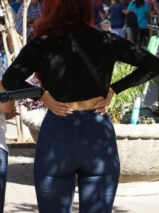 Redhead with a nice ass in tight jeans