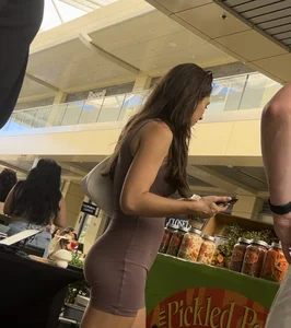Brunette with tight and perky ass in brown one-piece (OC)