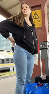 Train station pretty girl in tight jeans