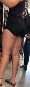 Tall thicc curly blonde in tight black shorts 0927