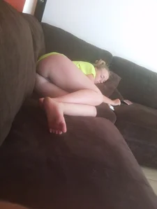 Girl fell asleep on a couch
